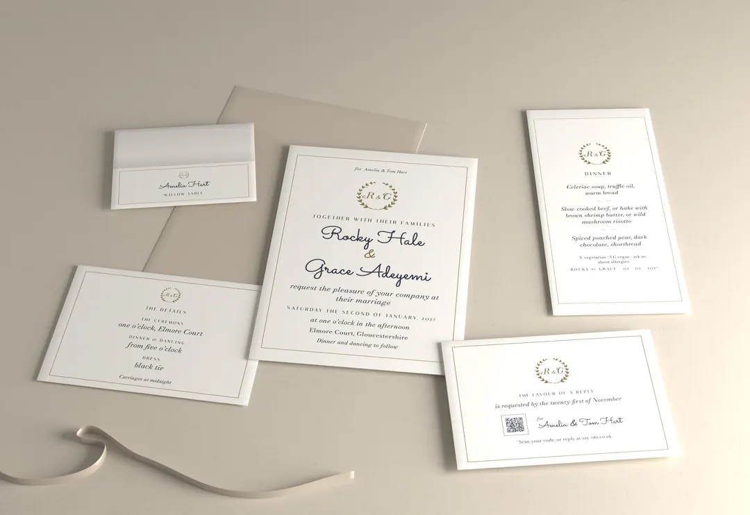 Midnight laurel wedding stationery suite, photographed: invitation, reply card, details card, place card and menu